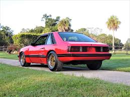Image result for Bright Red 1980 Capri