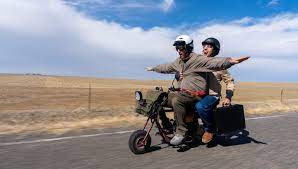 Dumb and dumber riding moped. Behind The Scenes Recreating The Dumb And Dumber Road Trip Revzilla