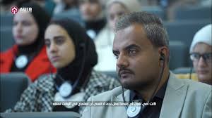 AUIB President Dr. Michael Mulnix warmly welcomes students from the Orchid  Institute