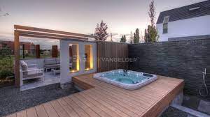 de volgerlanden onder de linden is een nieuwbouwkavel in de gemeente hendrik ido ambacht het is er grandioo moderne achtertuin jacuzzi buiten tuin en terras