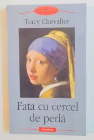 Fata cea mai mică şi fata cu bebeluşul aveau părul blond şi creţ ca mama lor, pe când părul celei mai mari era roşu închis ca al tatălui ei. Fata Cu Cercel De Perla De Tracy Chevalier 2003