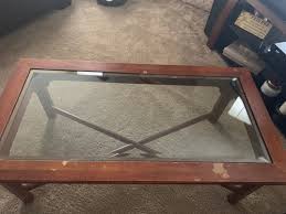 It still needs to be functional so there should be enough room to set down drinks, put up feet, or serve whatever purpose your household. Rehabbing Glass And Wood Coffee Table