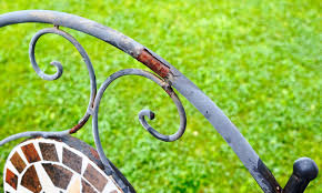 If you're trying to remove rust from some hard to reach or curved places, sanding off rust by hand is a great option. Painting Rusty Metal Garden Furniture Dainty Dress Diaries