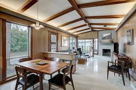 Open up a ceiling with a steel sandwich — an angled steel flitch plate bolted between rafters. Photo 2 Of 9 In This Winning Midcentury In Houston Can Be Yours For 260k Dwell