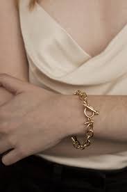 It helps to know how much gold may be worth and where to sell it for the best price. Simple Chain Link 18k Gold Plated Bracelet With Toggle Ettika