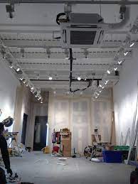 Linear suspended lighting is a perfect choice for lighting workplace. Track Lighting Suspended From 4 Metre High Ceilings Living Room Lighting Track Lighting Track Lighting Bedroom
