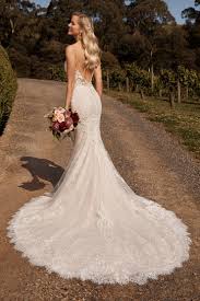 From fit & flare cocktail dresses to floral mini skater dresses, you'll stand out in any crowd! Glamorous Fit And Flare Wedding Gown With Low Back Sophia Tolli