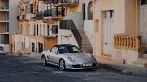Explore and download tons of high quality car wallpapers all for free! Download Wallpaper 2048x1152 Porsche Sports Car Building Facade Street Marsalforn Malta Ultrawide Monitor Hd Background