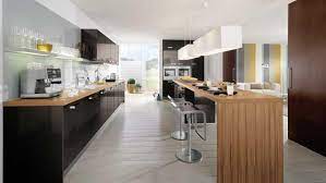 Petit îlot central en bois amovible et pratique pour les petites cuisines. Un Ilot De Cuisine Tout En Longueur Diaporama Photo