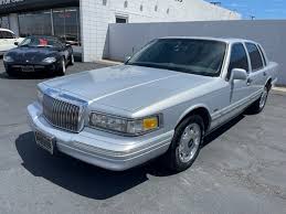 Image result for Ivory 1997 Town Car