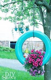 The hildred farm has been running for about 70 years, and has had numerous vehicles come and go, though the tires have stayed around. Make A Diy Painted Tire Planter From Old Tires Cute Garden Ideas Garden Crafts Diy Garden Projects