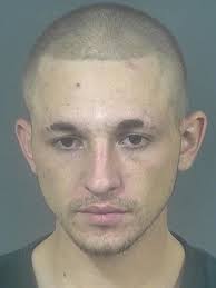 Man, 23, in custody after chase and manhunt that placed two schools