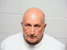 Father of man charged in Highland Park shooting makes statement with  T-shirt before starting jail sentence