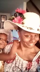 Grandma Amy beams with her children and grandchildren