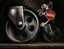 Casters, vintage industrial iron wheels. Iron Anarchy