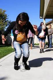 Tinkle In The Pot Hilarious Baby Shower Game Each Player Puts A Balloon Under Their Shirt While H Baby Shower Fun Baby Shower Party Games Baby Shower Games
