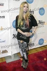 We are warriors out now: Photos And Pictures Wearing A Tiara Black Top Star Patterned Black Jeans And Leopard Print Heeled Boots Rocker Avril Lavigne Attends Her Abbey Dawn By Avril Lavigne Spring 2012 Fashion Show During Style