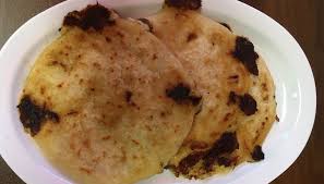 A pupusa is a thick griddle cake or flatbread from el salvador and honduras, made with cornmeal or rice flour, similar to the venezuelan and colombian arepa. Pupuseria A Taste Of El Salvador In Northeast Philadelphia Al Dia News