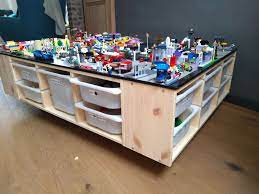 bouwblokken ruim je op met dit meest geweldige idee zoek er wel een handige harry of harriet voor jongens lego slaapkamer lego tafel lego slaapkamer