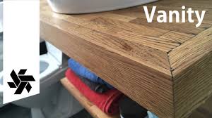 You may remember me talking about this huge project of turning an oversized guest bathroom into a smaller bathroom and third floor laundry room. Floating Parquet Vanity Diy Woodworking Bathroom Part 4 Youtube