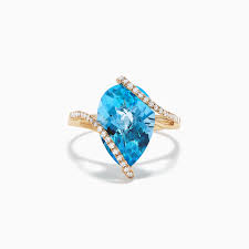 Free overnight shipping | save up to 75% off. Effy Ocean Bleu 14k Yellow Gold Blue Topaz And Diamond Ring 6 28 Tcw Effyjewelry Com