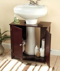 While none of the procedures for disassembling the plumbing are difficult, you'll need an extra. Pedestal Sink Storage With Images Pedestal Sink Storage Small Bathroom Storage Sink Storage