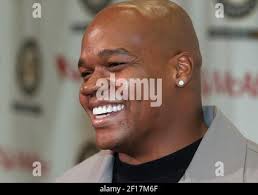 Former major league player Frank "Lefty" O'Doul, now in his first season as  manager with the San Francisco Seals, is flanked by his two outfield aces,  Joe Martyn, left, and Joe DiMaggio,