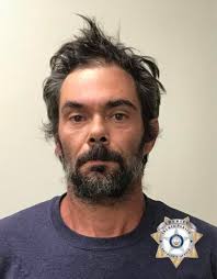 Man arrested after body found