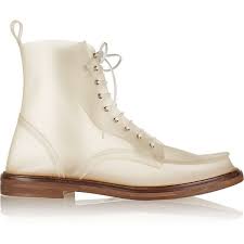Mm6, the contemporary line from parisian label maison martin margiela, advocates a fashionably the main label began in 1988 by radical conceptual designer martin margiela, who is renown for not giving interviews or made a curtain bow at a runway show since founding his namesake couture house. Mm6 Maison Margiela Pvc Boots Boots Combat Boots Mm6 Maison Margiela