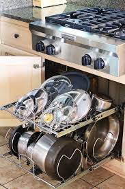Running out of kitchen cabinet space? Kitchen Storage Cabinets The Best Pot Rack And Cabinet Organizers