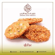 برازق تعتبر من أشهر الحلويات العربية عبارة عن قطع دائرية ه ش ة م غ ط اة بالسمسم مقرمشة تستحق التجربة الرياض جده عرعر الجو Arabic Books Food Accounting