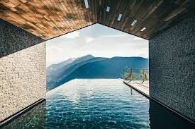 Infinity Pool Looking Out Over The Mountains Boutique Hotels Design Hotels Design Pool Designs