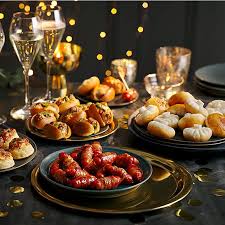 Quick and easy canapes to pass round at a party, including savoury and sweet nibbles from mini parma ham tarts and pea and prawn crostini to caramel nutella lollies. Perfect Christmas Party M S Ie