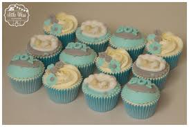 Make your baby shower a memorable one with best baby shower centerpieces. Baby Shower Cupcakes It S A Boy Blue And Grey Cupcakes Edible Baby Cloud Baby Shower Cupcakes Shower Cupcakes Mini Cupcakes