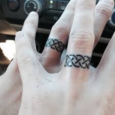 A ring band finger tattoo. 55 Wedding Ring Tattoo Designs Meanings True Commitment 2019