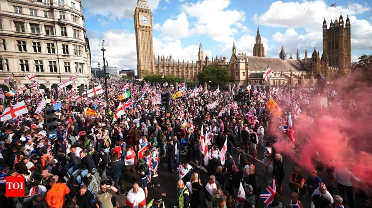 Bottles, flares, projectiles' hurled: Far-right London rally draws record  crowds; why they are protesting - The Times of India