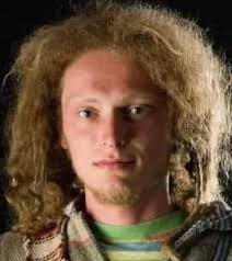 His name is Bill. He has wild hair, wears a T-shirt with holes in it,  jeans, and no shoes. This was literally his wardrobe for his entire four  years of college. He