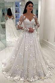 Follow this guide and you'll be transformed from plain jane to cinderella in no do your curves some justice and accentuate your figure in elegant style with a pretty waist sash. Gorgeous Long Sleeves V Neck Lace Classy Bridal Gowns Ivory Backless Modest Wedding Dresses W578 Wedding Dress Sleeves Ball Gowns Wedding Online Wedding Dress