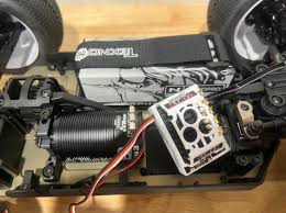 Can you guys tell if this is the stock rear wing Mount or the plus 10 from  looking at this picture...