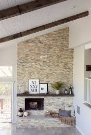 Place the sofa facing the fireplace, centered, forward of the side hall. Stacked Stone Above Fireplace Living Room With Fireplace Big Living Rooms Off Center Fireplace