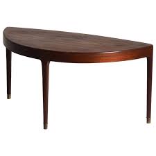 The tabletop is made from solid pine wood and has a butcher block style with visible wood grain and knots for a rustic, antique look. Rare Coffee Table In Teak Danish Architect 1960s For Sale At 1stdibs