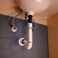 In the first picture, the flexible trap is actually a listed component. Better Trap Simple Drain