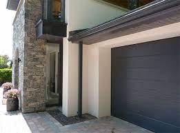 Thermador Residential Insulated Sectional Garage Doors Are Manufactured Using Kingspan Door Panel And Kingspan Compon Sectional Garage Doors Garage Doors Doors
