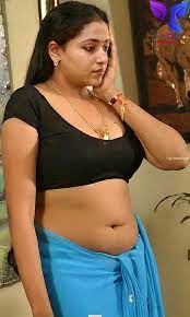 Mallu Aunty Displays Her Perfect Pair of Breasts in Captivating and Erotic Gallery