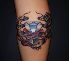 It is not just a form of embellishment, it can also help you express yourself, especially if you love anything vibrant, expensive and sturdy, as a diamond tattoo signifies all these. The Diamond Tattoo Meaning And Ideas Diamond Tattoos Diamond Tattoo Meaning Diamond Tattoo Designs
