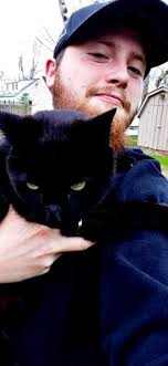 Soul mate: Orono Cemetery cat lived double life as family pet, comforter to  countless