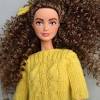 If you have ever shopped for a doll, then you know that the vast majority of dolls on the market have shiny, straight hair. 1