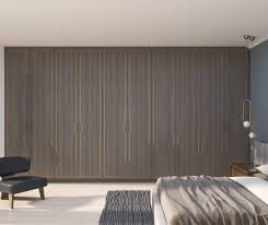 Inside of wardrobe is sprayed in a satin finish and the exterior is sprayed in high gloss. Fitted Wardrobes London Bespoke Wardrobes London Made To Measure Wardrobes London
