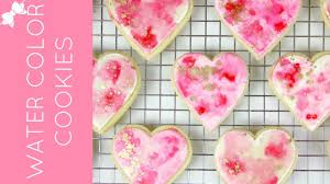 Watercolor paint lends itself well to recreating flowers. How To Make Pink And Gold Diy Watercolor Sugar Cookies Lindsay Ann Bakes Youtube