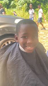 DR MICHAEL DARVILLE GIVES BACK TO SCHOOL